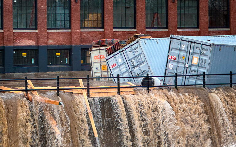 Water gushing in front of a building