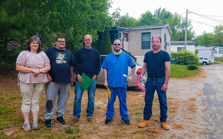 Five representatives at Charter Oaks Village.