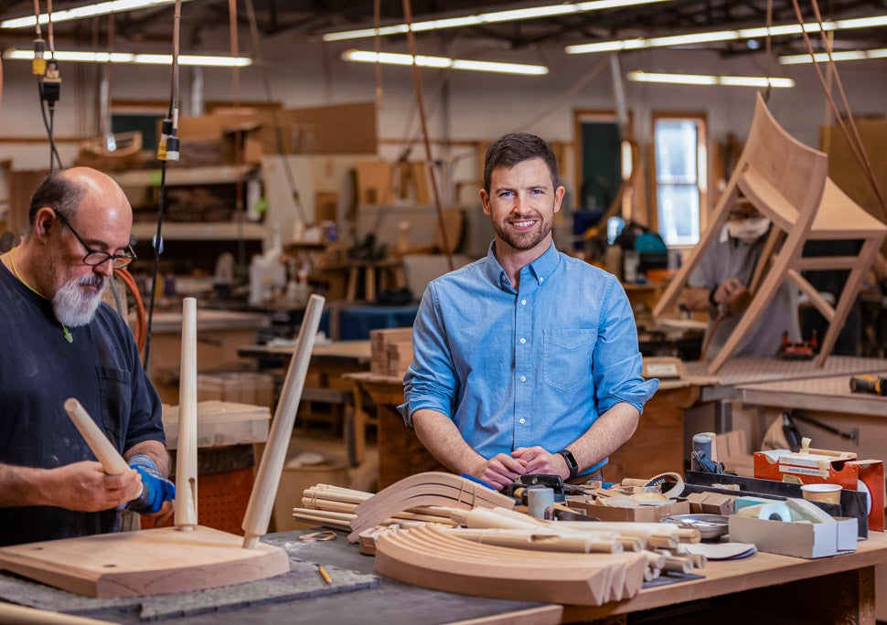 Philip Hussey and Mike Bomser of Thos. Mose, inside the shop.