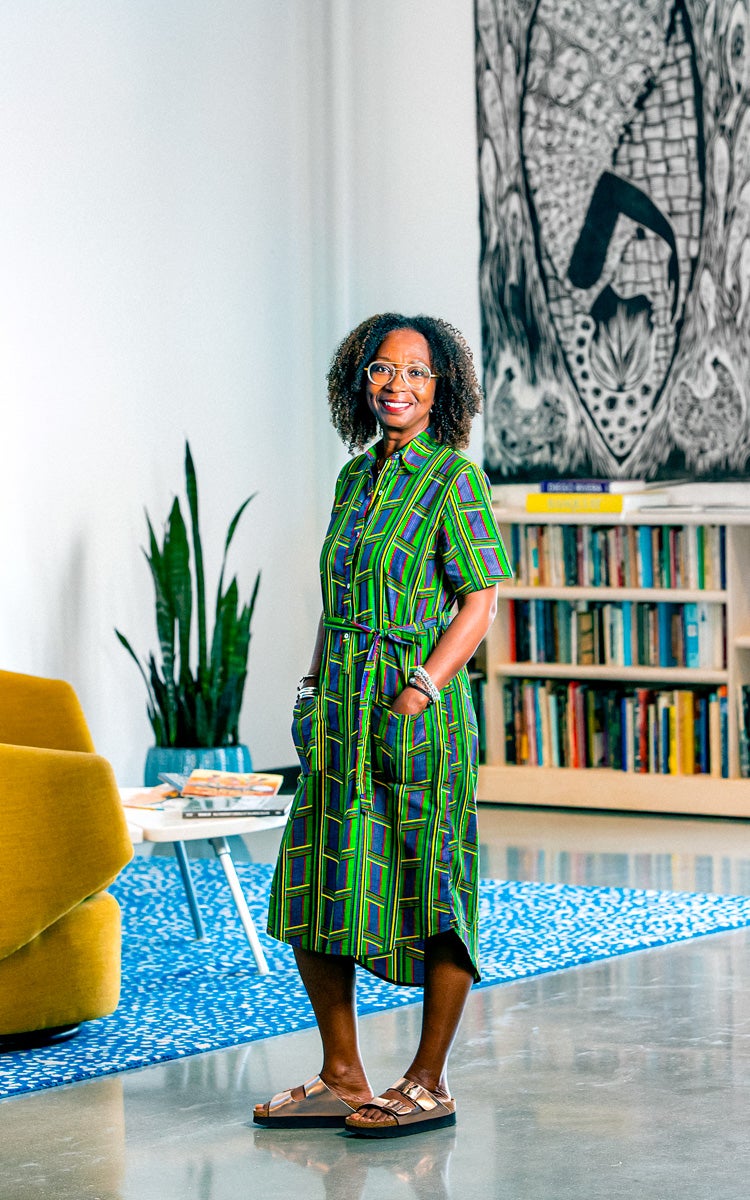 Marcia Minter standing in gallery