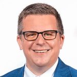 40 Under 40: Andrew Cook is a banker who’s focused on more than dollars and cents