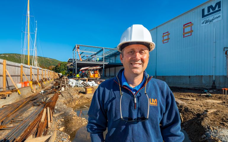 person at construction site wearing hardhat