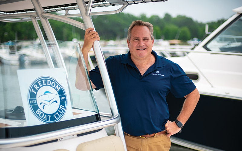 Steve Arnold on a boat