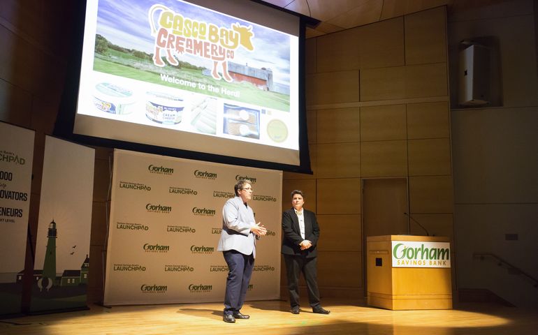 Two entrepreneurs on stage at LaunchPad event in 2019