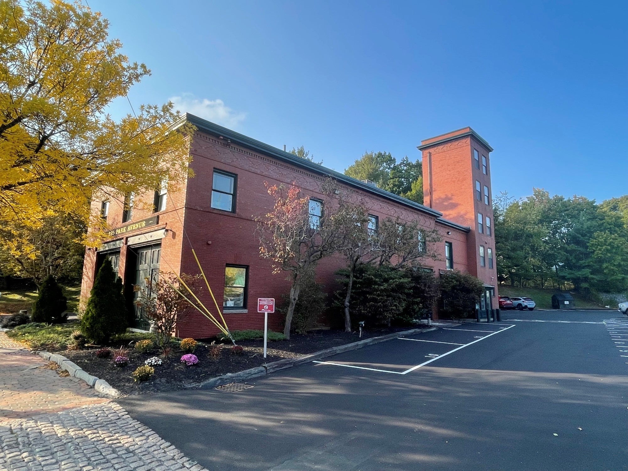 old brick building and parking lot