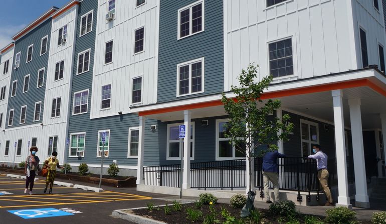 A modern four-story apartment building