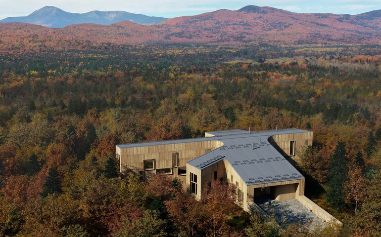 aerial of buildings and woods