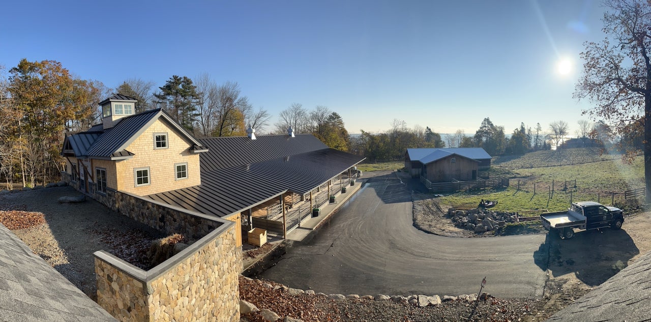 aerial view of buildings and field
