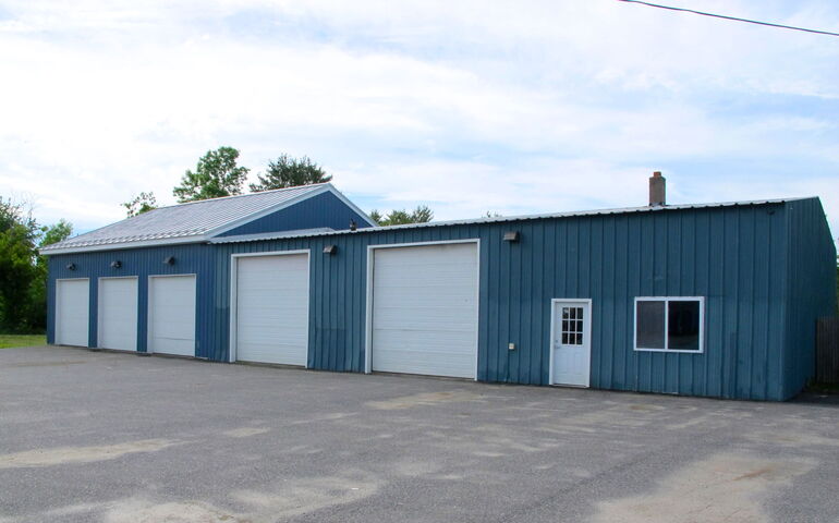 A green metal building.