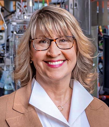 A person poses for a headshot.