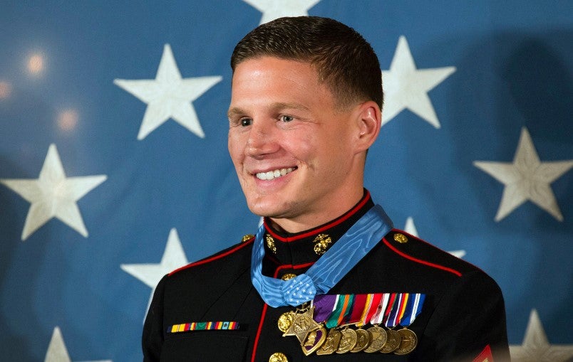 A person poses for a headshot.