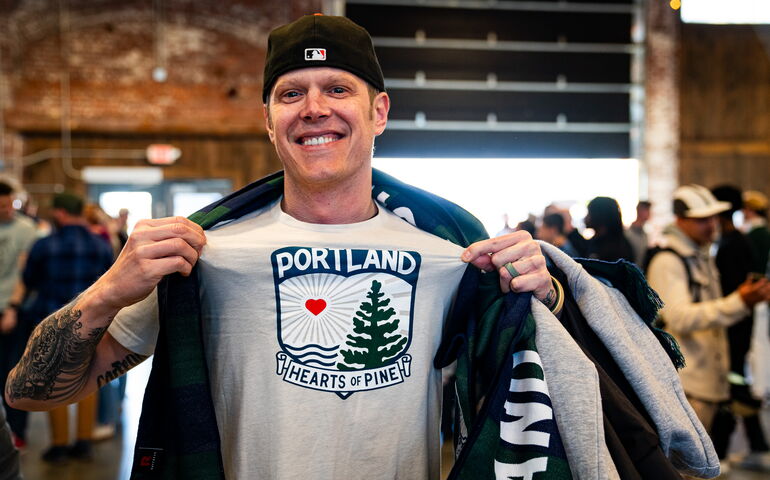 Soccer fan with merchandise