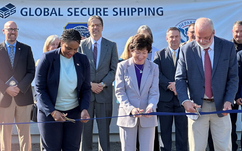 People cut a ribbon.