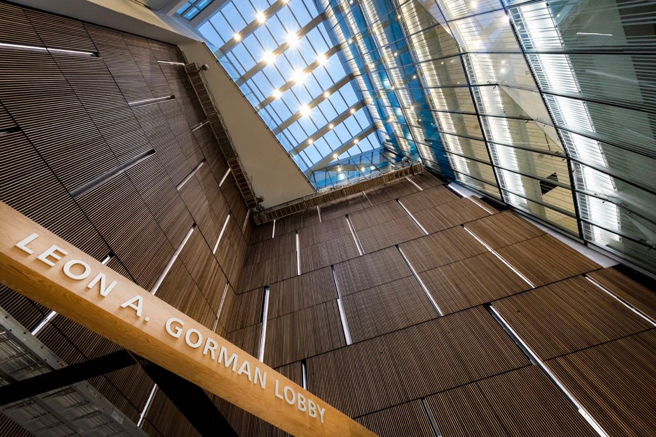 This photo looks up at a cathedral ceiling.