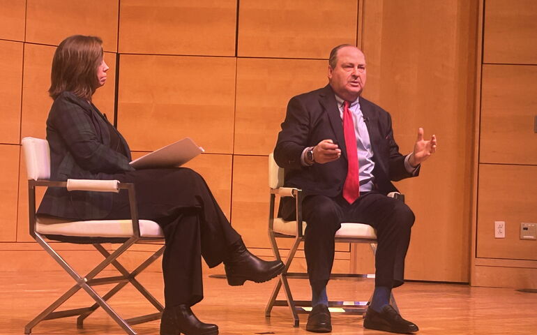 Portland Eggs and issues event on Jan. 9. Two people on stage.