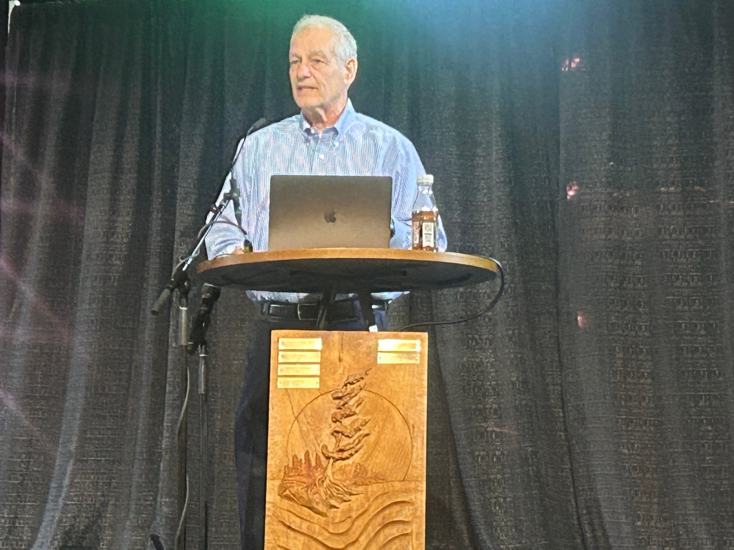 Joe Edwards on stage at the Maine manufacturing summit