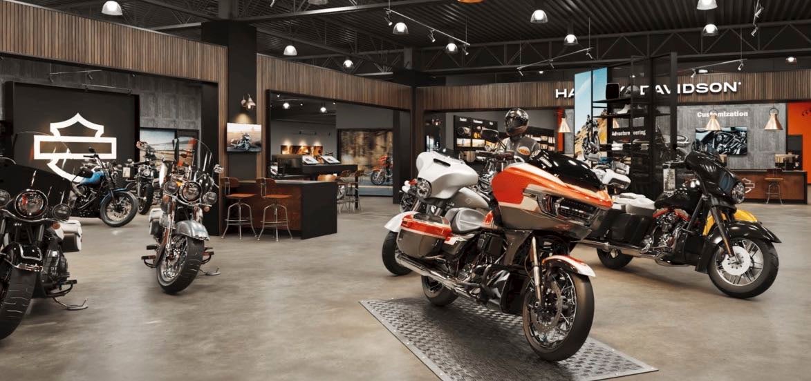 A rendering shows a store interior with motorcycles.