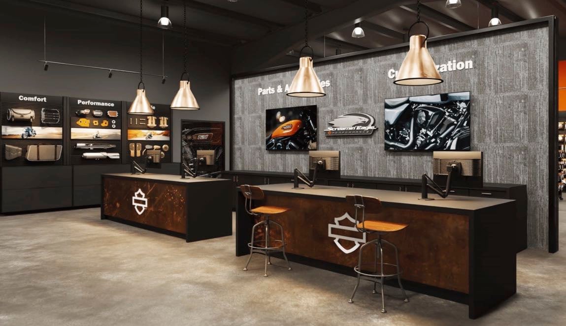 A store interior shows counters and stools.