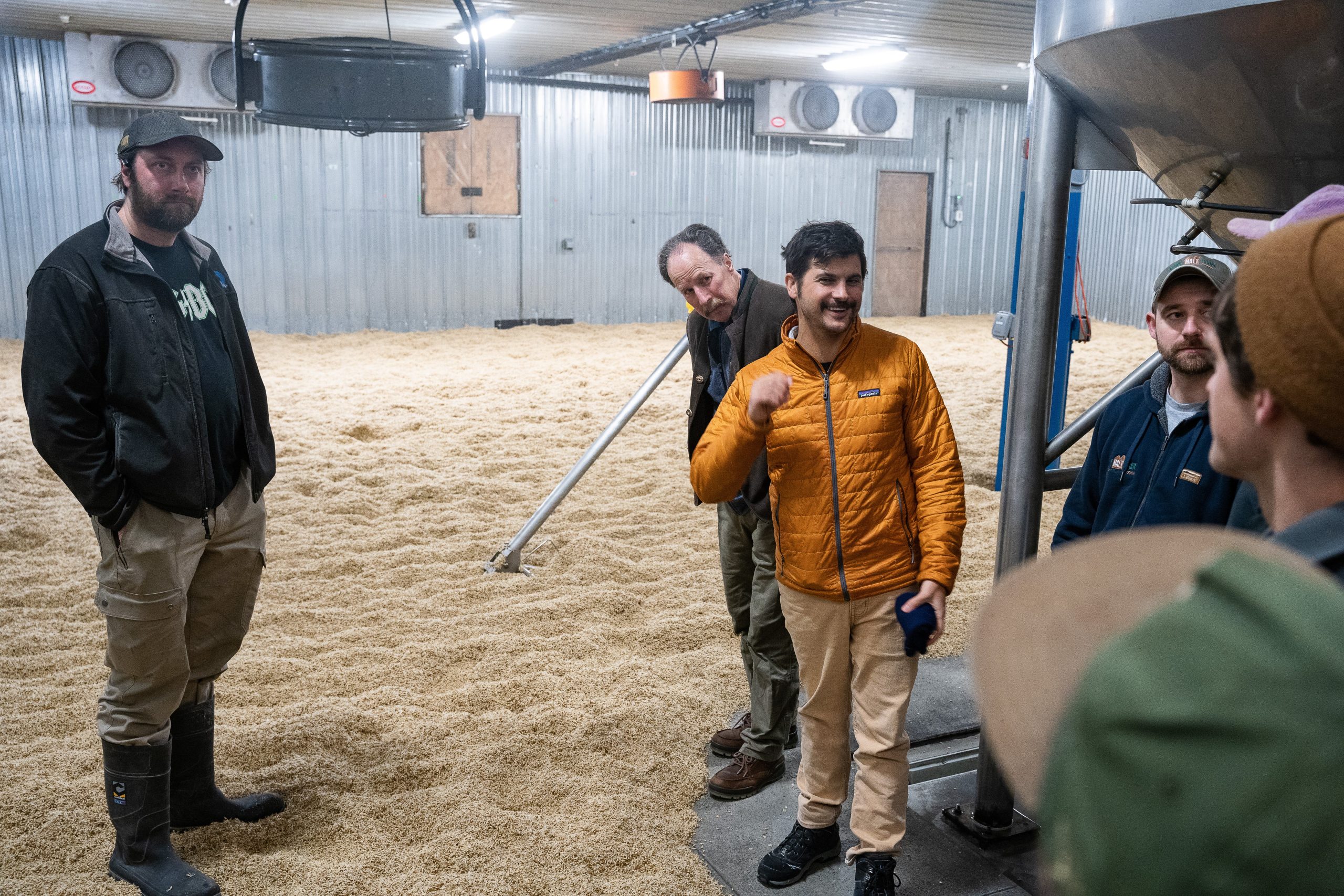 people standing in factory