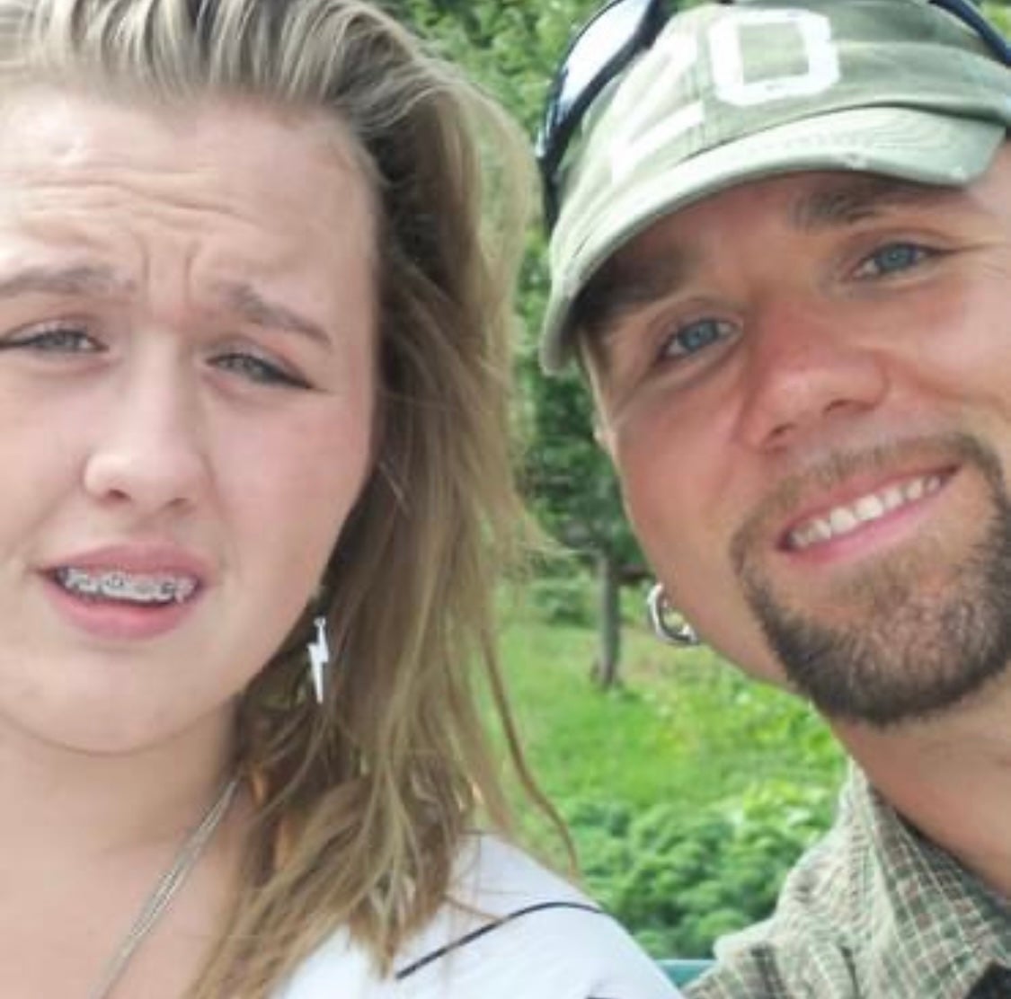 This closeup photo shows the owner of Kennebec Roofing with his daughter.