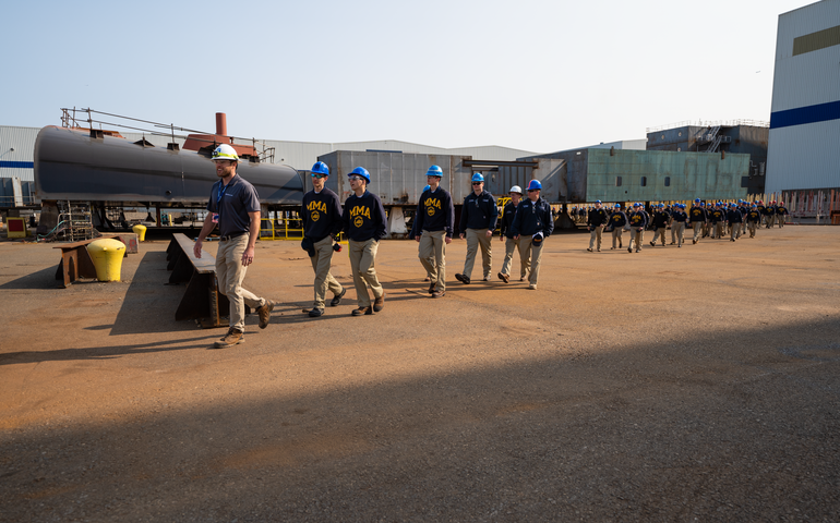 people walking in line outside