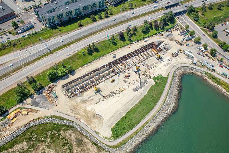 An aerial view shows strucutres built into the ground.