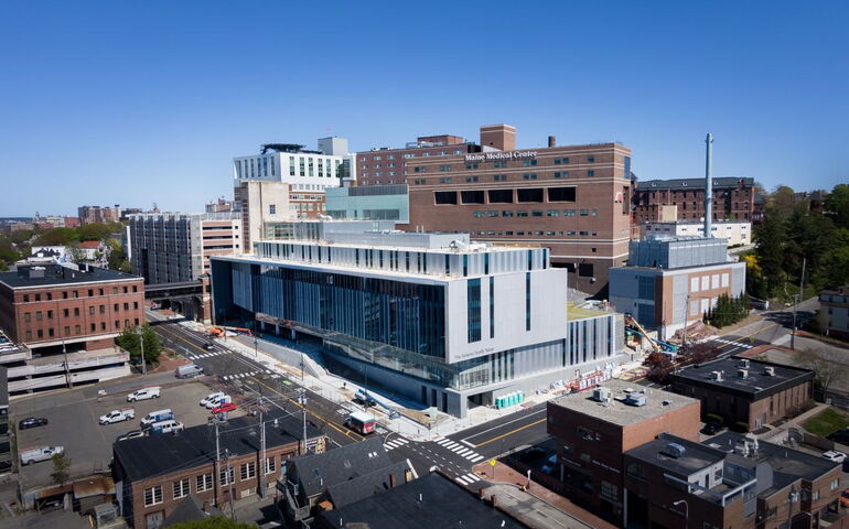 The Malone Family Tower is the off-white building in front of Maine Medical Center's older building.