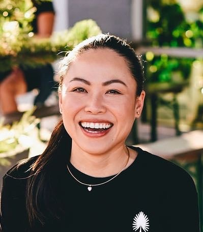 A person poses for a headshot.