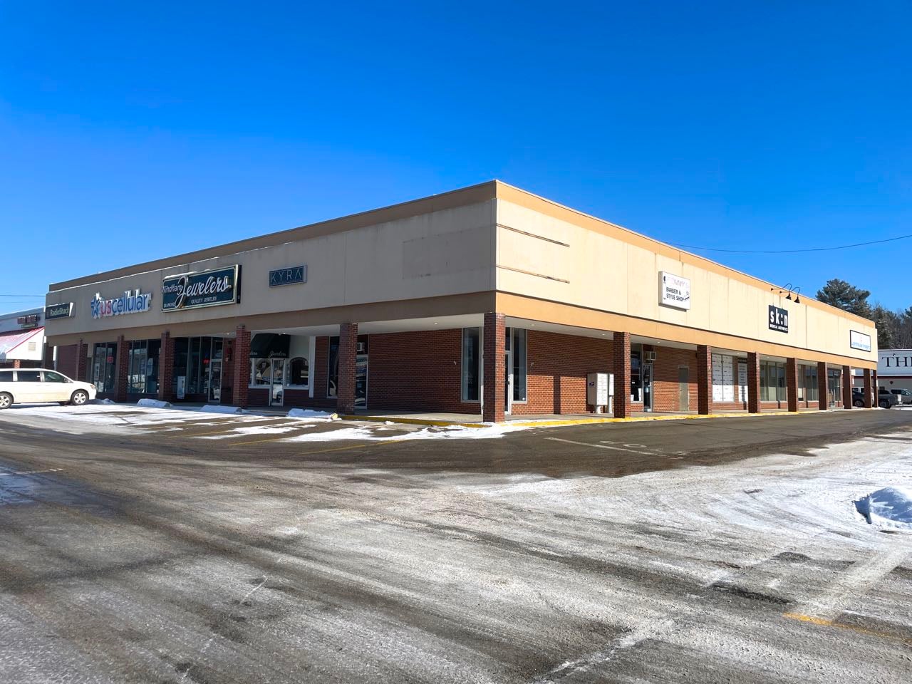 The corner of a building with roadways.