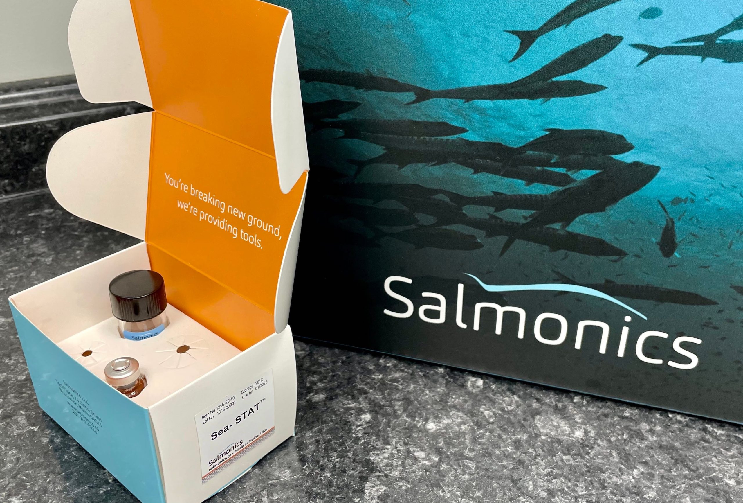 A box has vials in it.