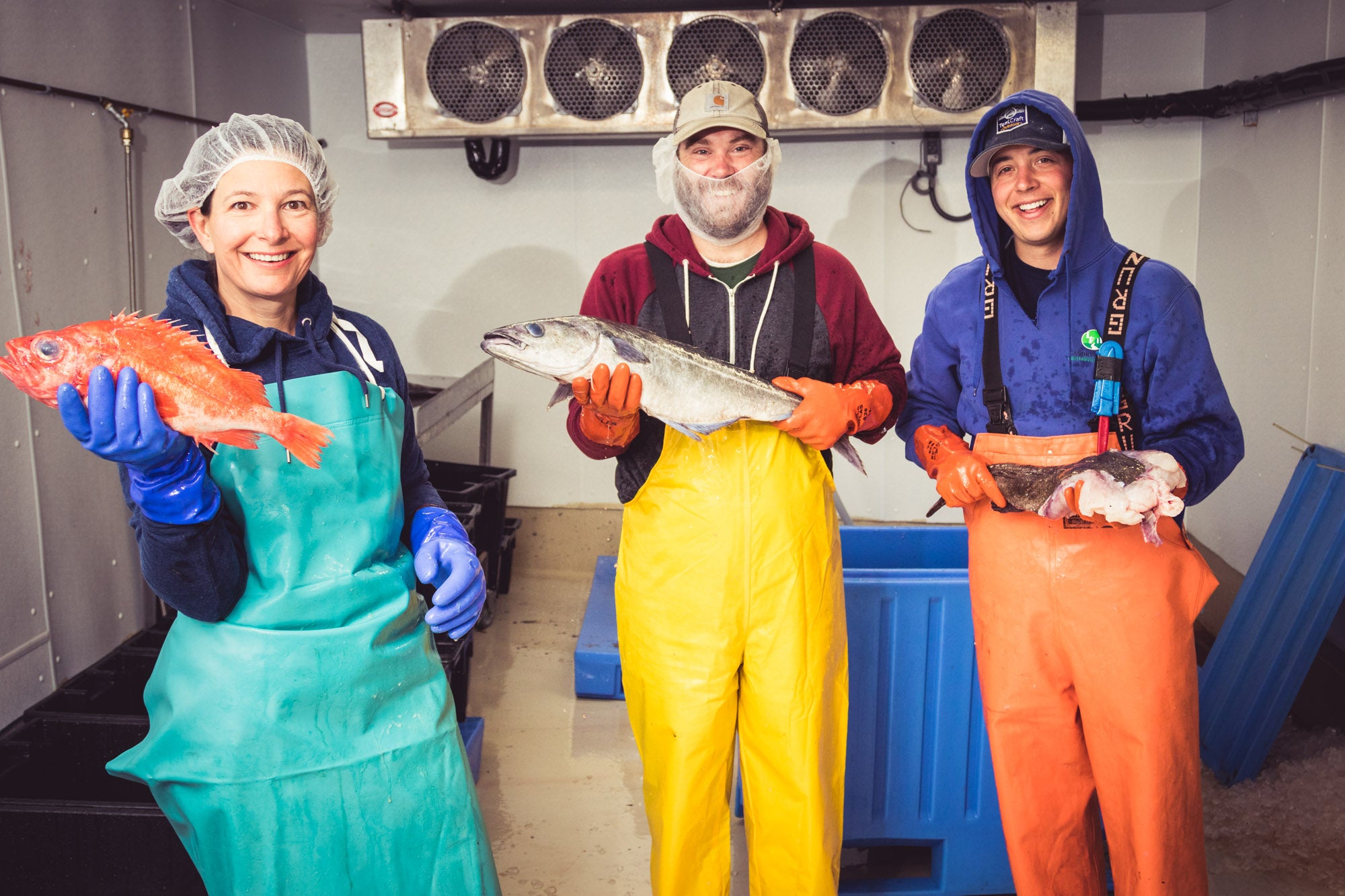 3 people with fish
