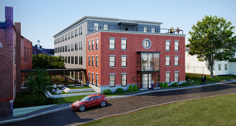 A rendering of a a brick apartment building on a street