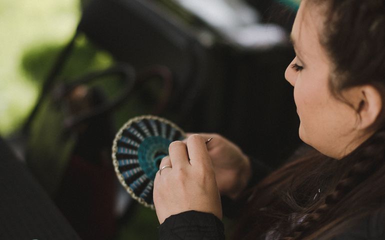 person making basket