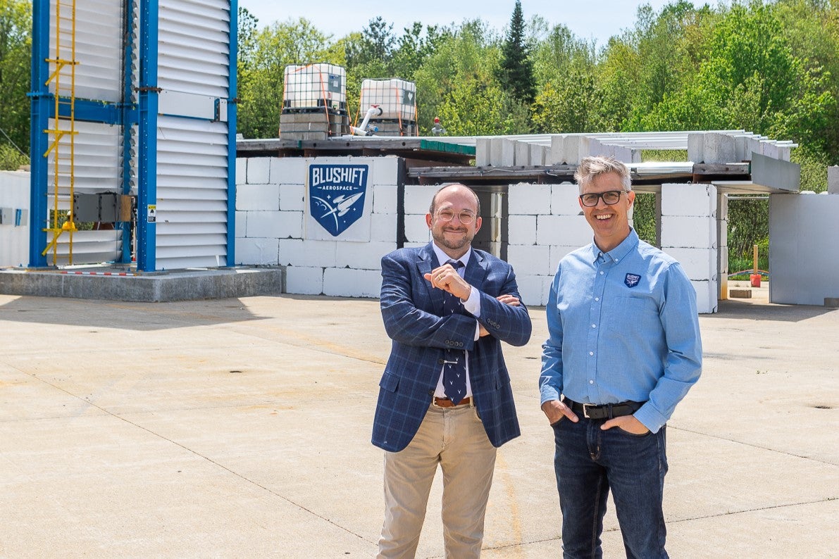 Sascha Deri of bluShift stands with the new board chair at Brunswick Landing.