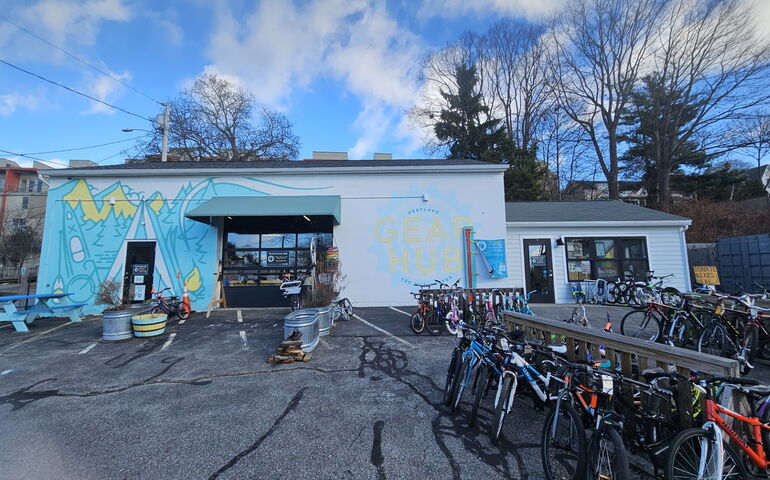 A small shop with bikes out front.
