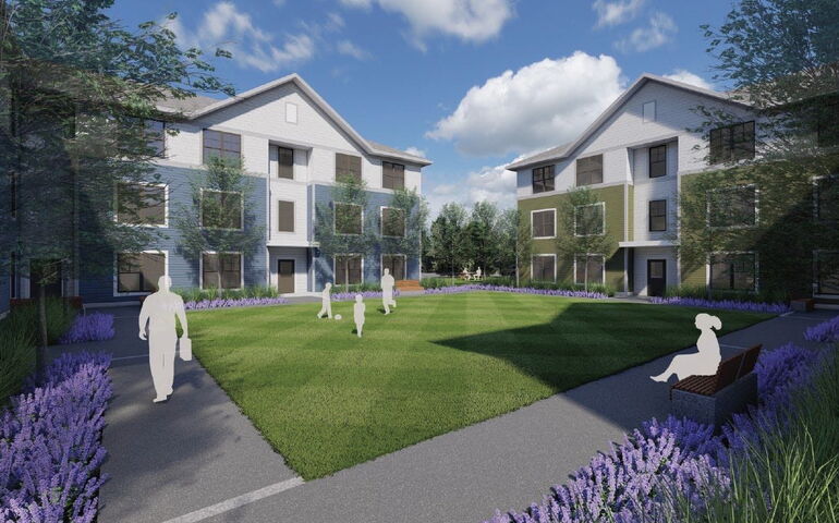 A drawing shows a lawn and two buildings.