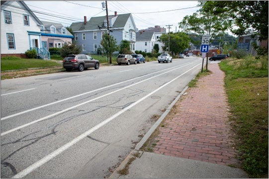 street and sidewalk and cars