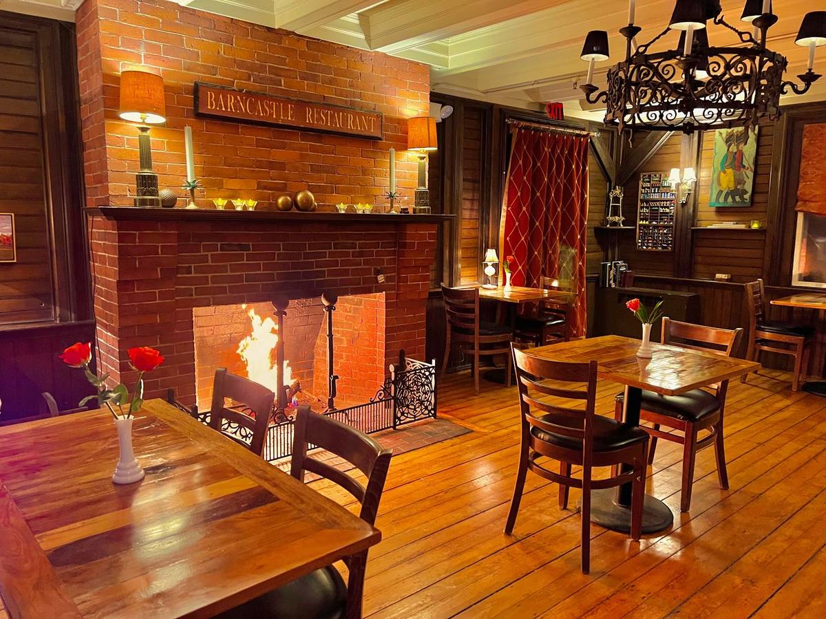 brick fireplace in dining room