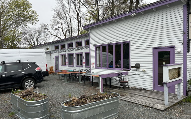 old brick building and cracked pavement