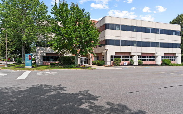 3-story building and parking lot