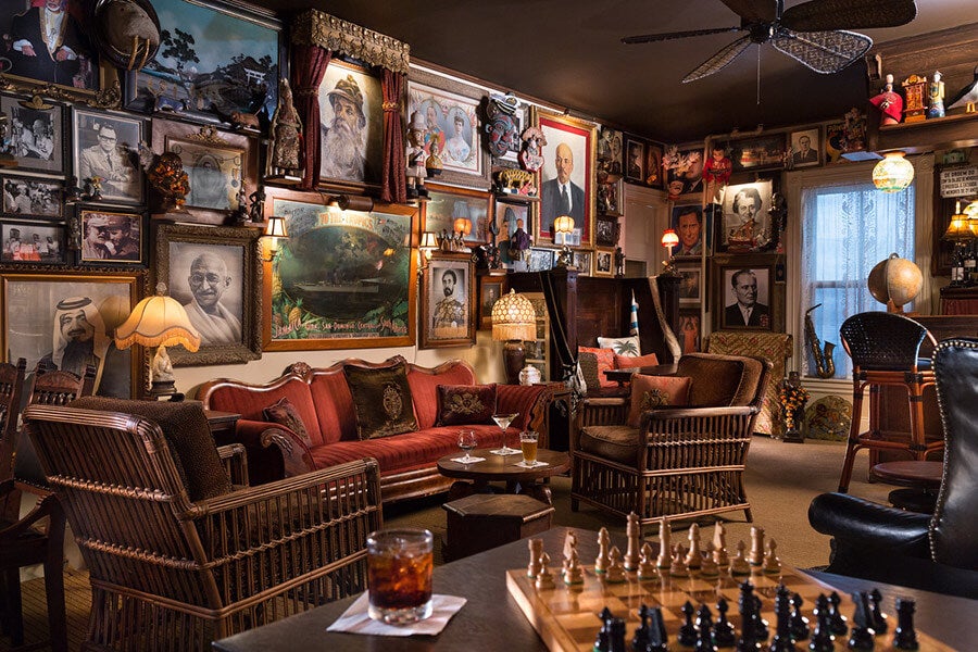 pub with furniture chess board paintings
