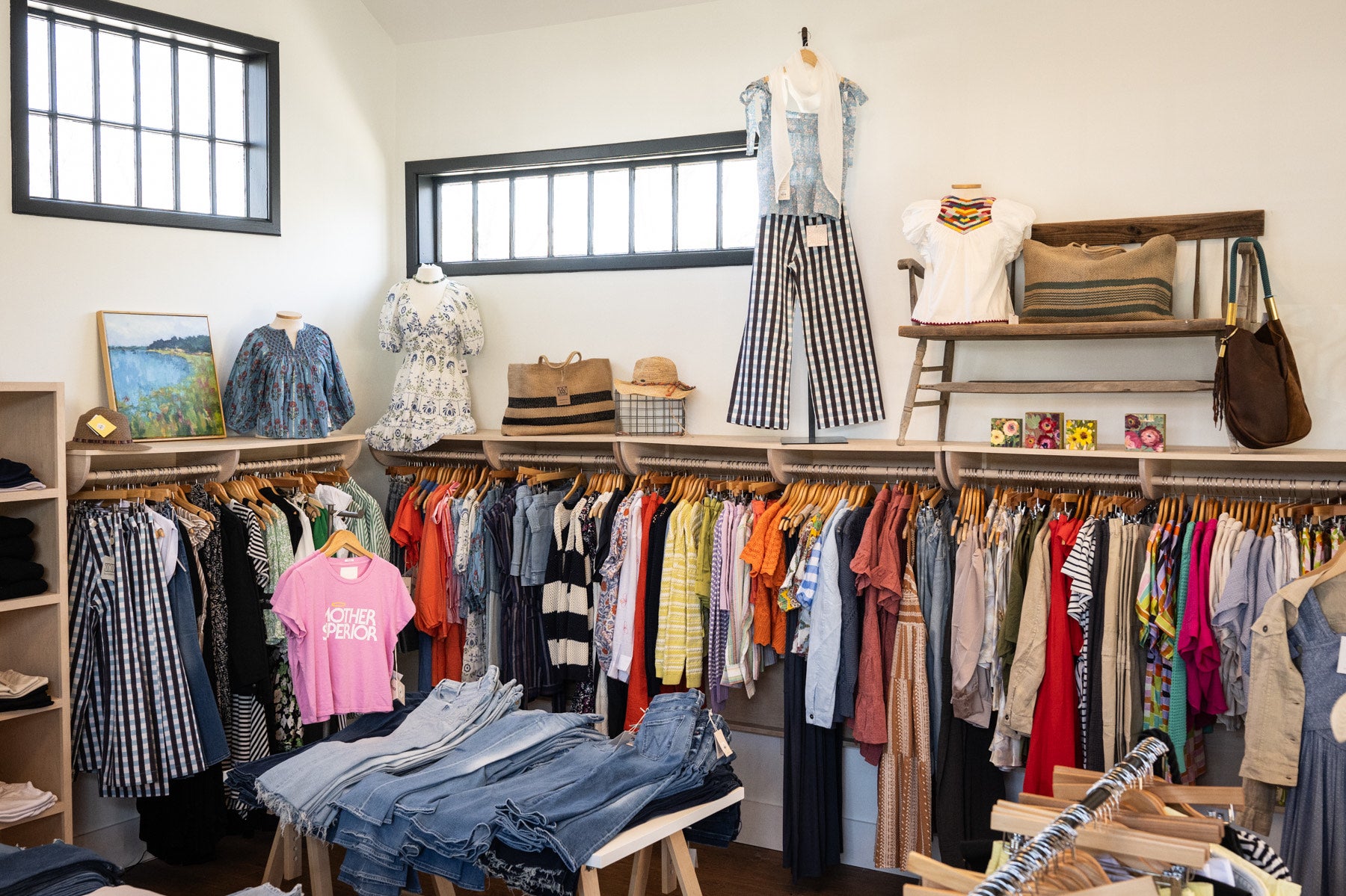 The inside of Gingham shows racks full of clothes.