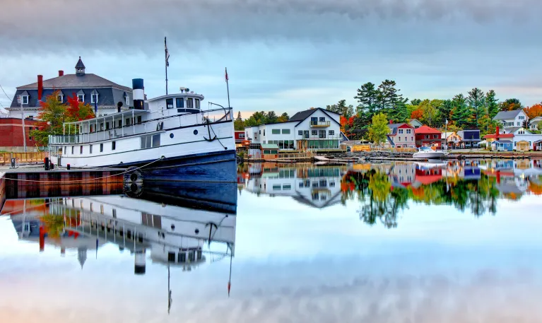 Boats, structures and water are very colorful.