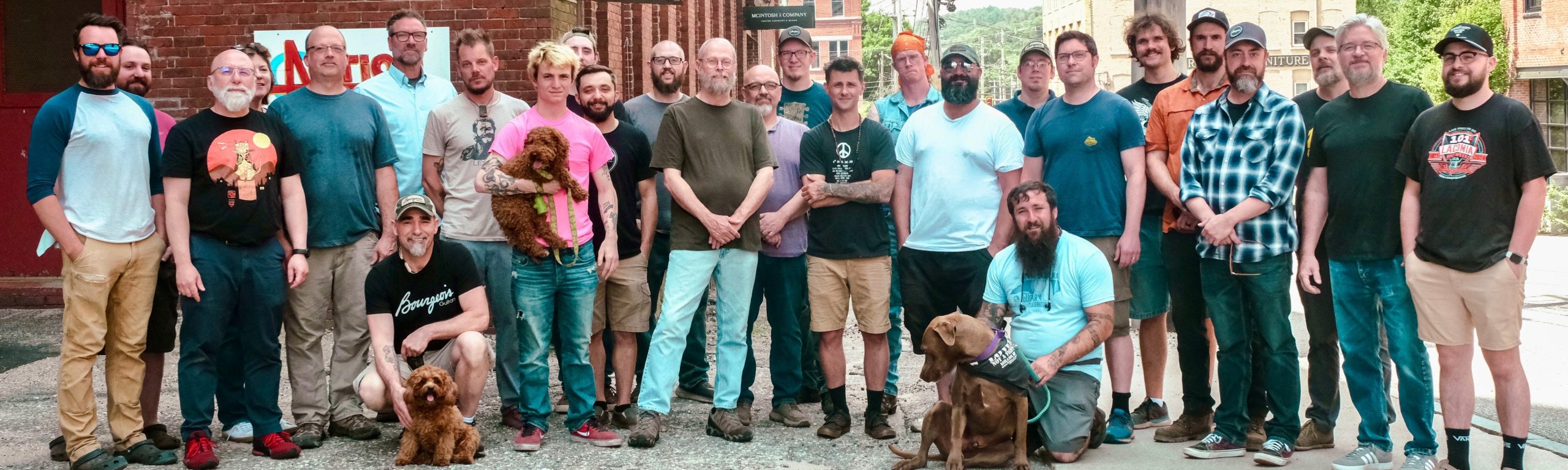 Employees of Bourgeois Guitars in Lewiston gather for a group photo.