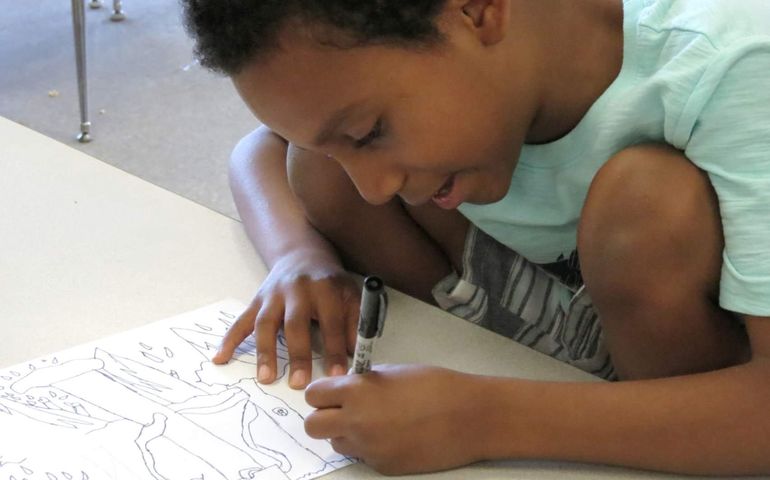 Photo of a child drawing