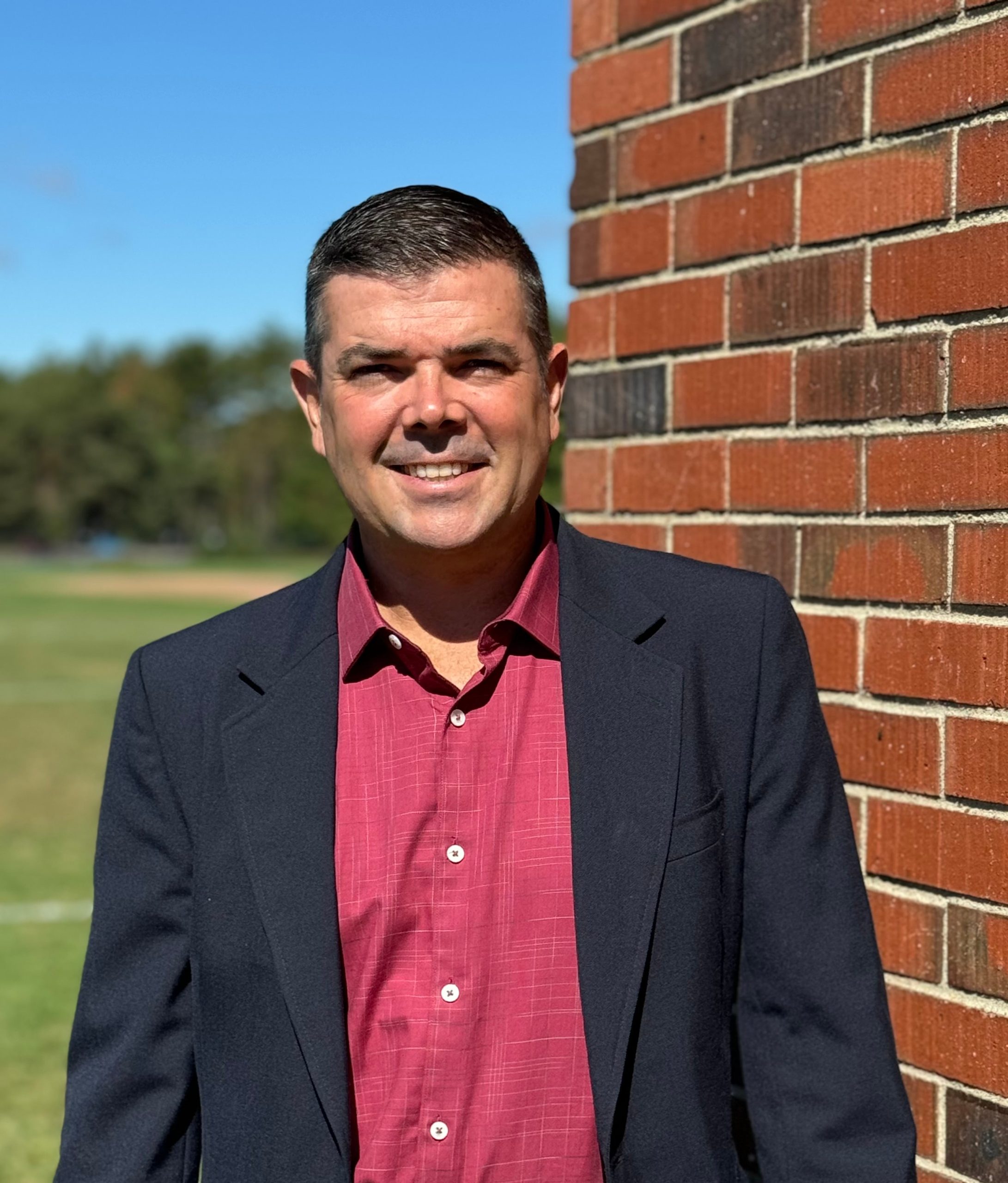 Tuck O'Brien stands outside.