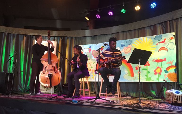 Musicians on stage at One Longfellow Square