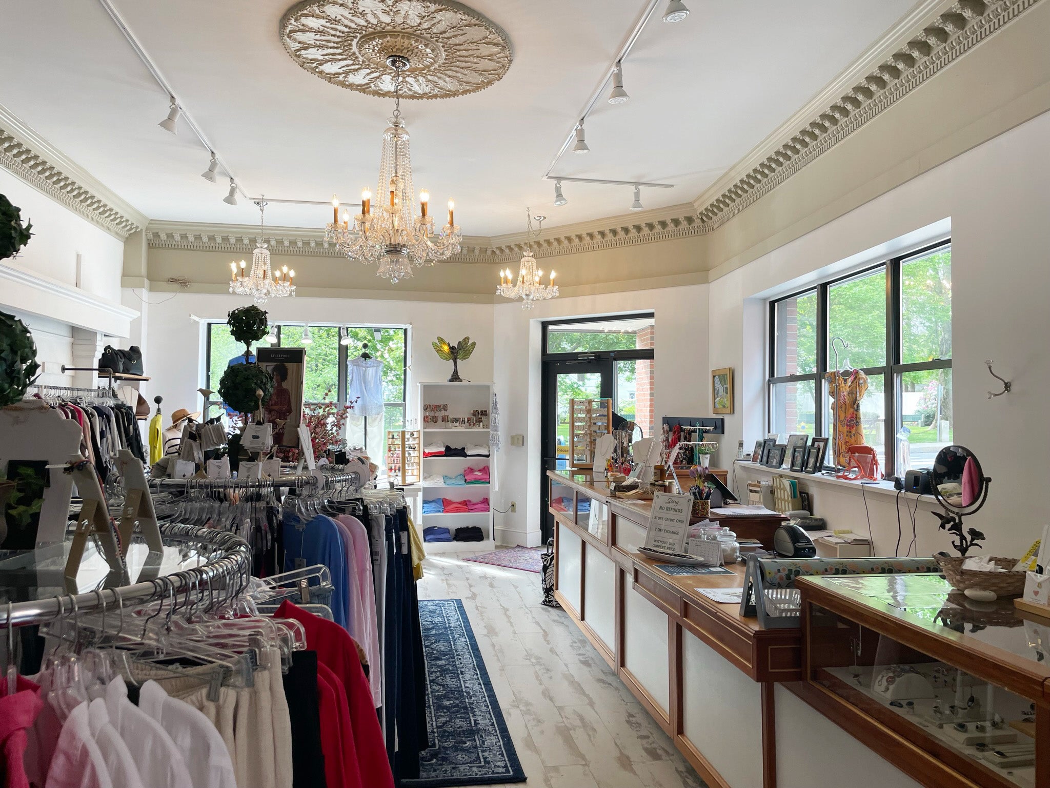 racks and counters and cases with clothes and accesories