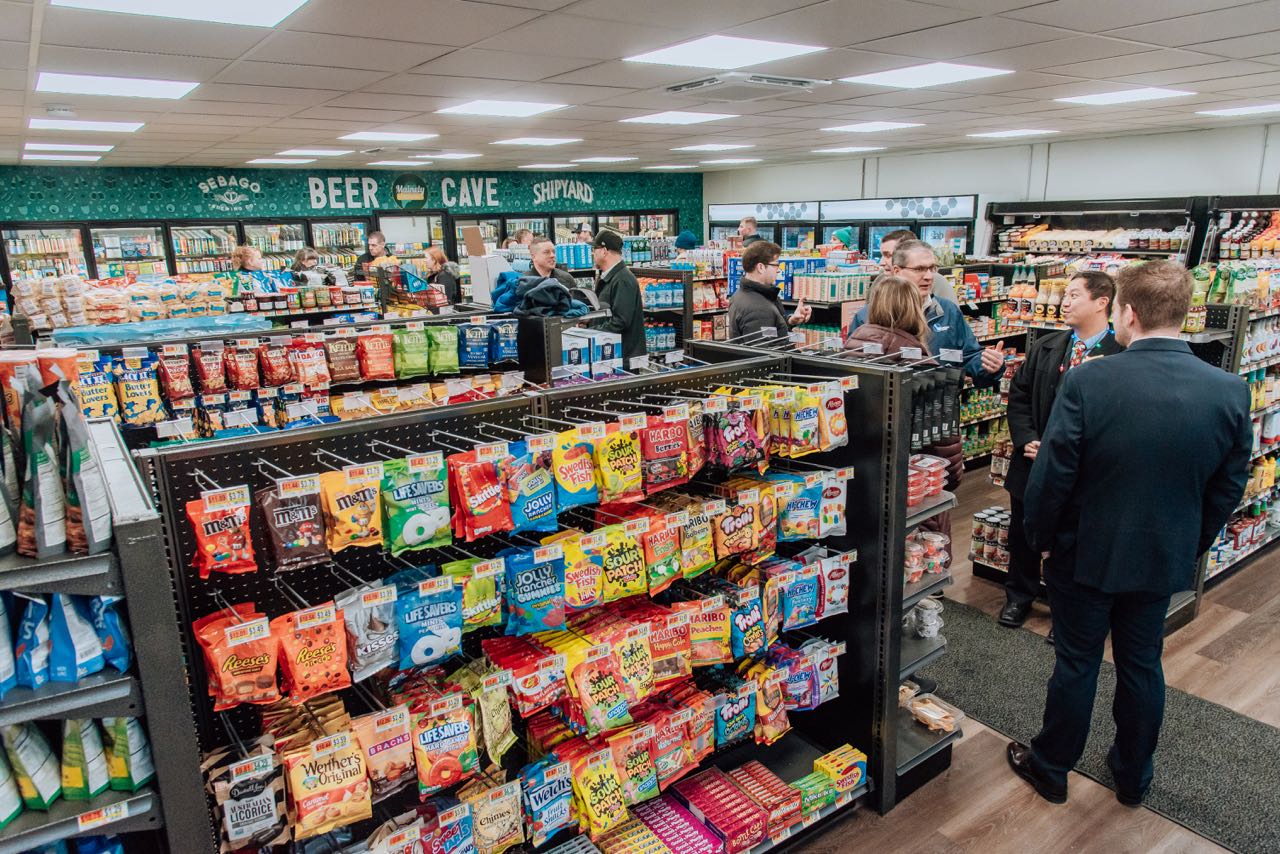 The interior of a store is stocked with products.