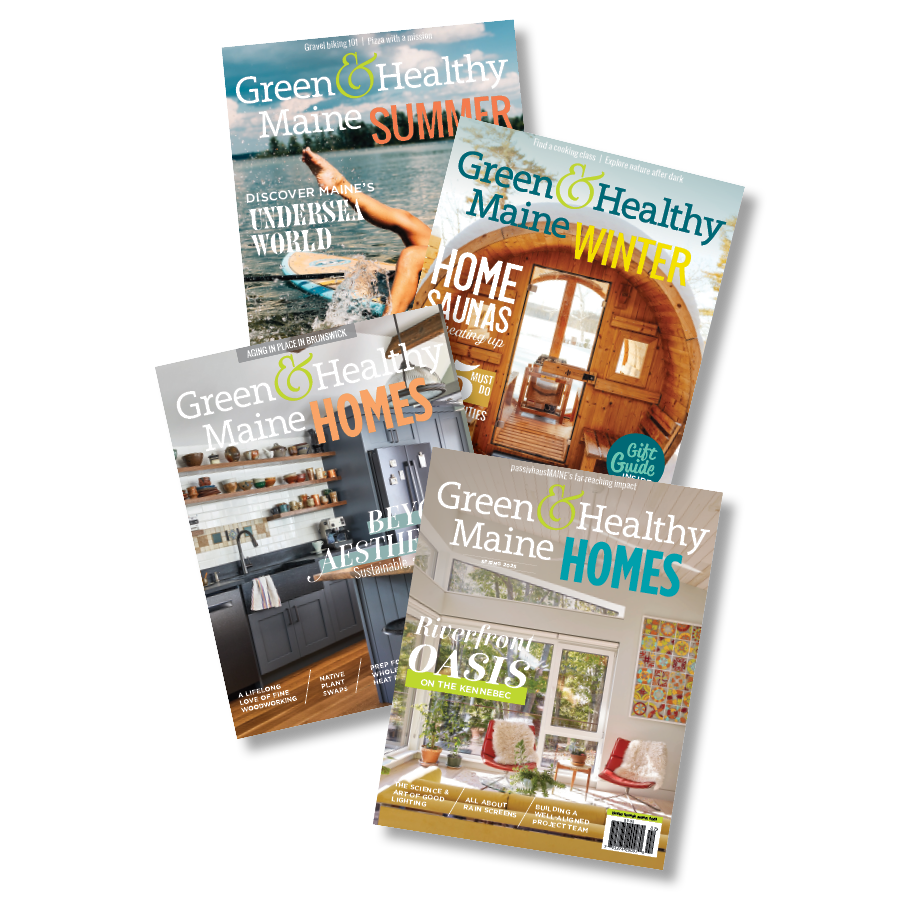 A stack of four magazines.